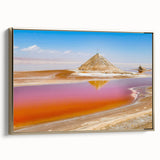 Framed canvas wall art depicting a Tunisian landscape in muted gold and black tones, ideal for bedroom decor.