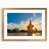 Extra large abstract art print of a Cambodian landscape, featuring textured earth tones, in a gold frame.