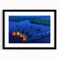 Colorful abstract art print of a Myanmar landscape in vibrant hues on a textured canvas, framed in black.