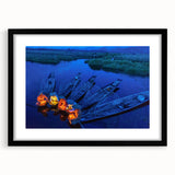 Colorful abstract art print of a Myanmar landscape in vibrant hues on a textured canvas, framed in black.