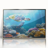 Acrylic print of the Great Barrier Reef in cool blues and greens, framed in silver, suitable for modern art wall decor.