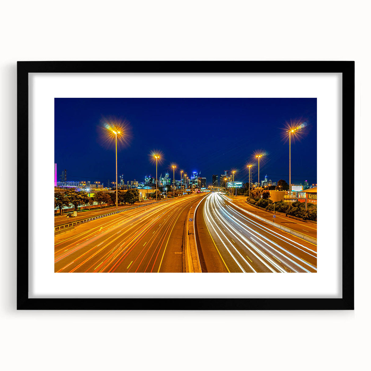 Extra large colorful abstract art print of Melbourne scenery on textured canvas, framed in black.