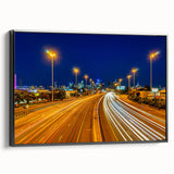 Black and white wall art featuring a vintage poster style landscape of Melbourne on a framed canvas.