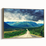 Framed canvas of a vintage-style landscape painting depicting the Northwest Territories, in muted gold and black tones.