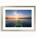 Textured art print of abstract scenery in muted earth tones, framed in silver, ideal for bedroom ambiance.