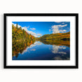 Extra large wall art featuring a colorful, abstract depiction of Quebec scenery, presented in a black frame with mat.