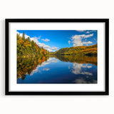Extra large wall art featuring a colorful, abstract depiction of Quebec scenery, presented in a black frame with mat.