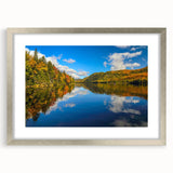 Textured abstract art print of a serene Quebec landscape in muted green and blue tones, framed in silver.