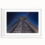 Abstract art print of a Central American scenery in muted earth tones, framed with a white mat.