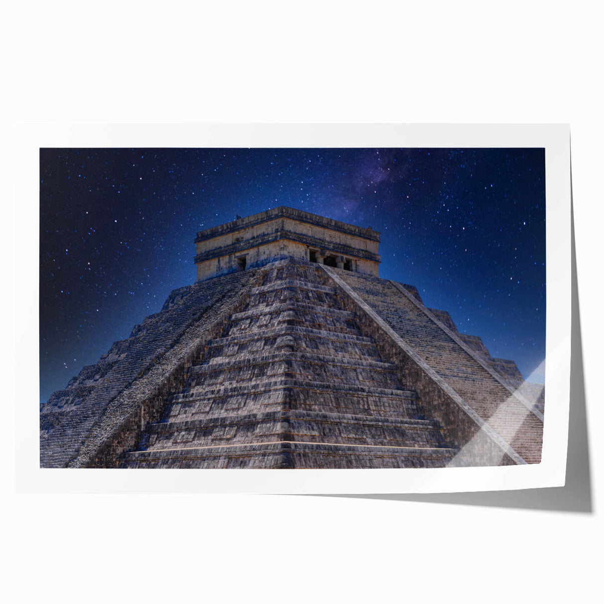 Rolled print of a Central American scenery featuring lush greenery and a distant mountain, in earthy tones.