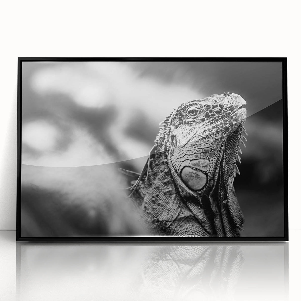 Large abstract wall art depicting a colorful Central American scenery on a black framed acrylic.