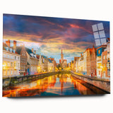 Large abstract wall art of a European scenery in muted blue and green tones on acrylic glass.