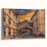 Framed canvas of a vintage Oxford landscape painting, featuring muted tones with black accents, suitable for office decor.