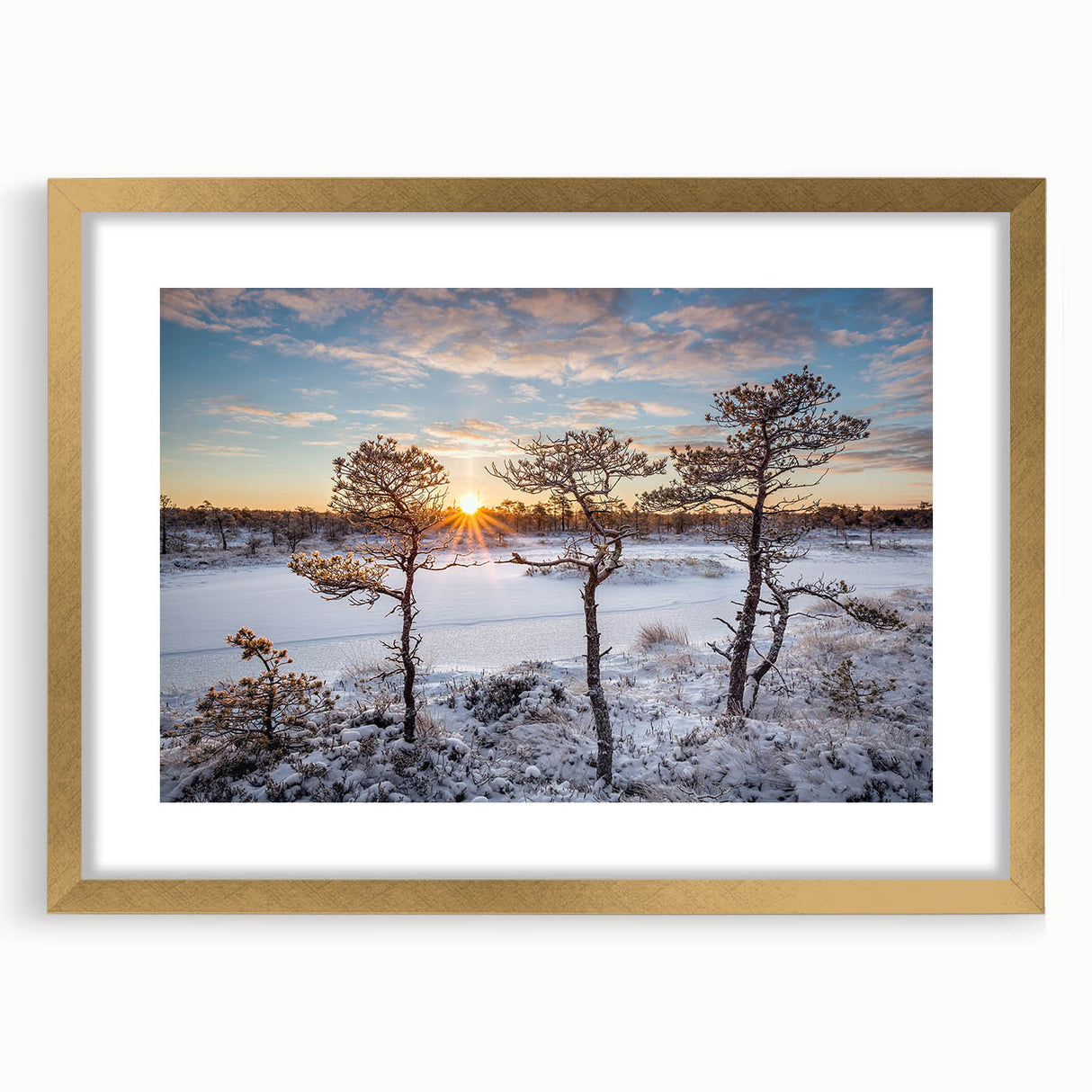 Abstract art print depicting a European scenery in muted gold and green tones on a framed canvas.