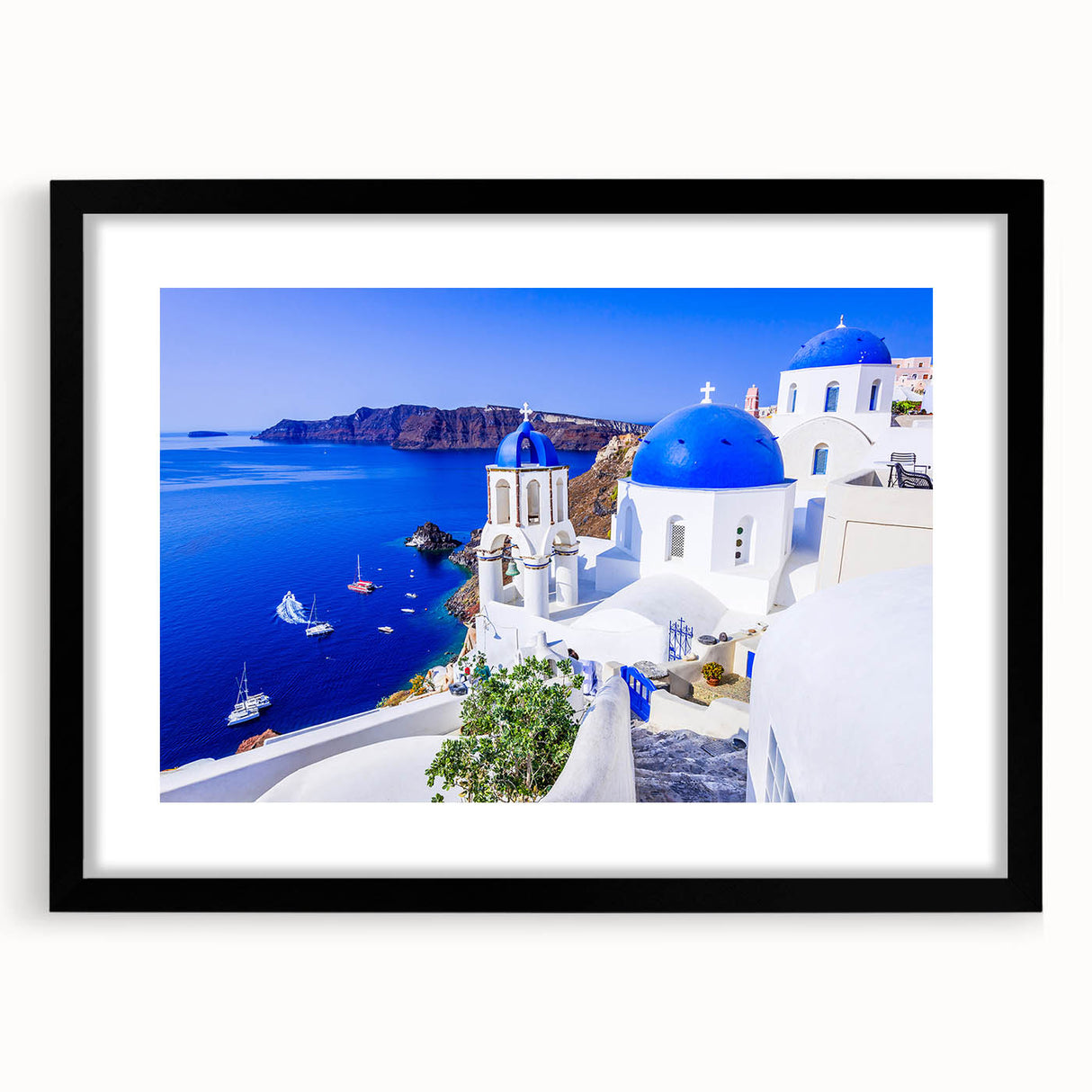 Extra large framed print of abstract Santorini scenery in vibrant blue and white, ideal for living room decor.