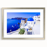 Extra large wall art of Santorini with textured abstract prints in vibrant blue and white, framed in silver.