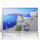 Mid-century modernist art of Santorini with vibrant blue and white tones on a framed acrylic print.