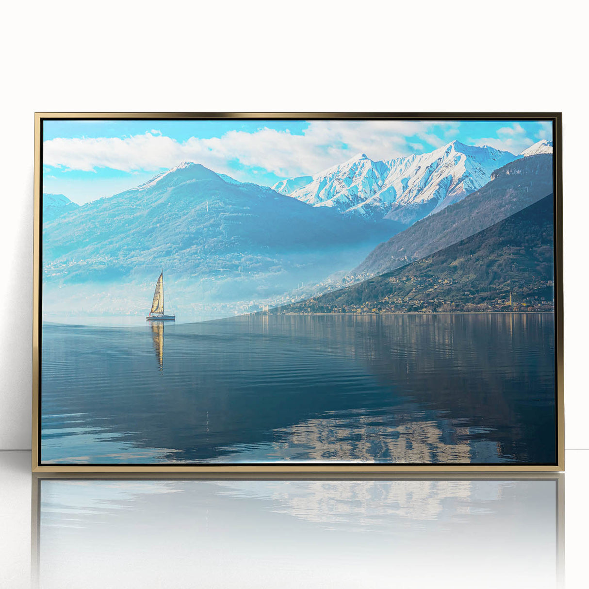 Framed acrylic print of Lake Como with a gold frame, featuring art deco style and soft blue and green tones.