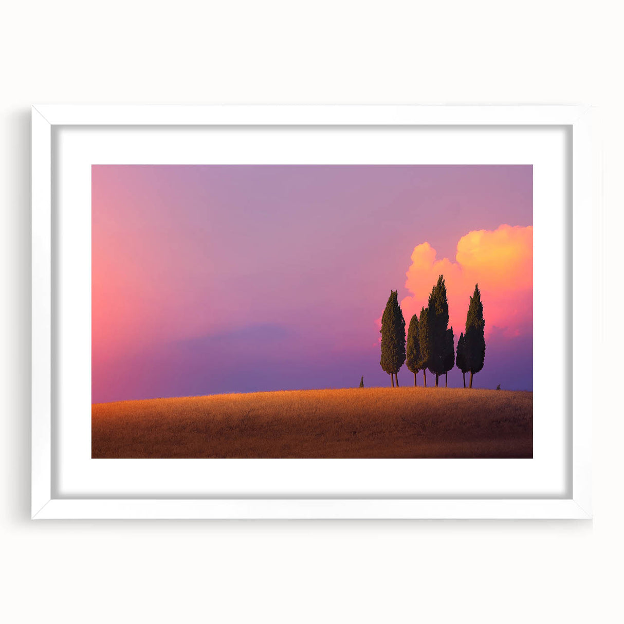 Textured abstract art print of Tuscany landscape in muted earth tones, framed with a white mat, ideal for bedroom decor.