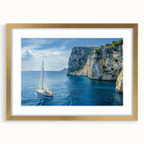 Abstract art print of the Mediterranean Sea in muted blue and green tones, framed with a gold mat.
