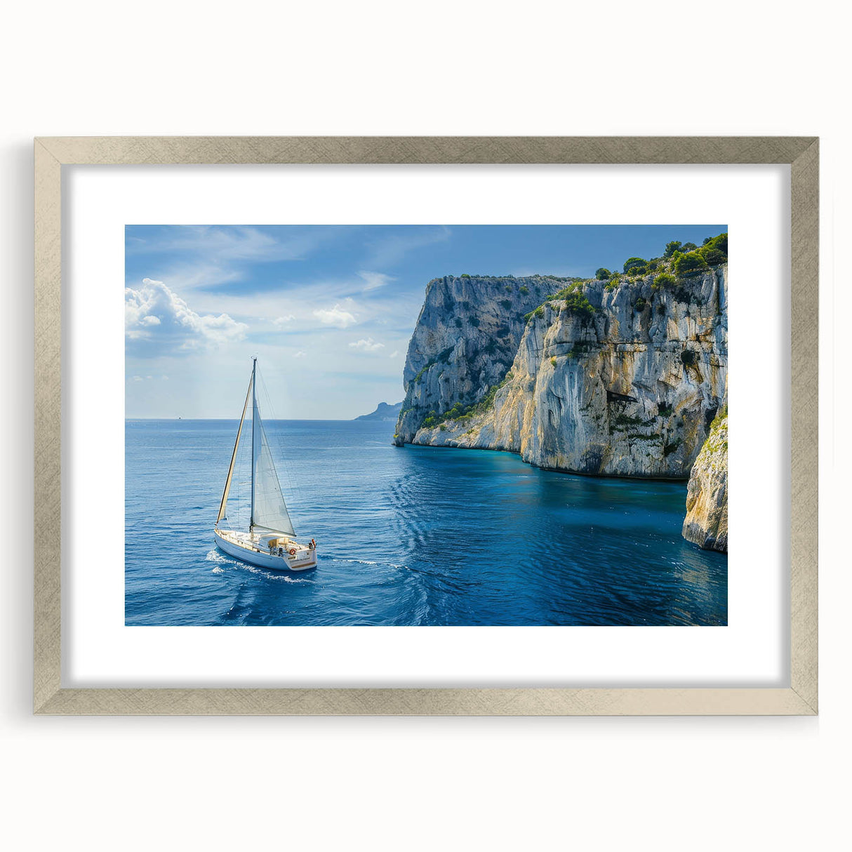 Extra large abstract art print of the Mediterranean Sea, in muted blue and white tones, framed in silver.