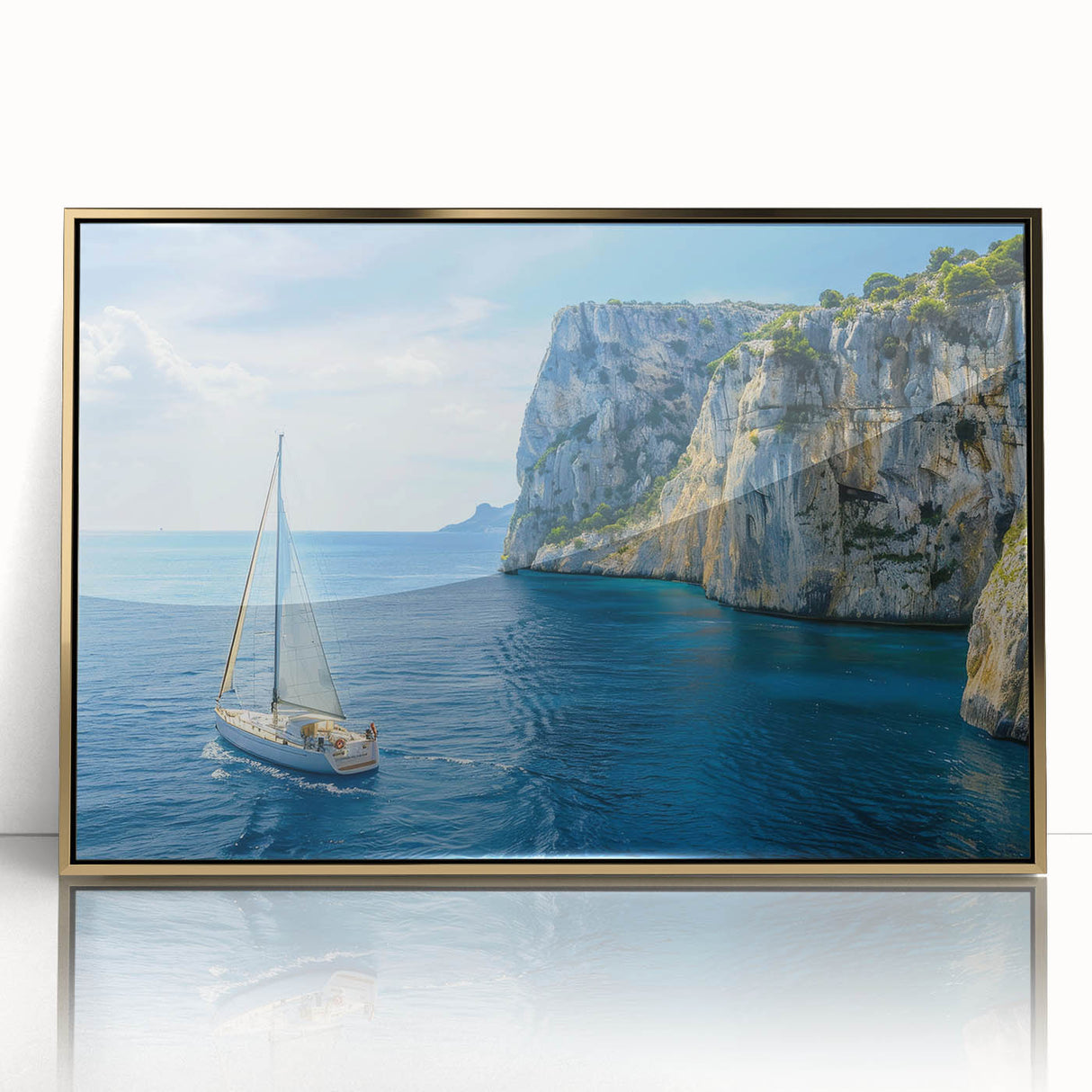Acrylic print of a Mediterranean seascape in soft blue and gold tones, framed in gold, suitable for modern art wall decor.