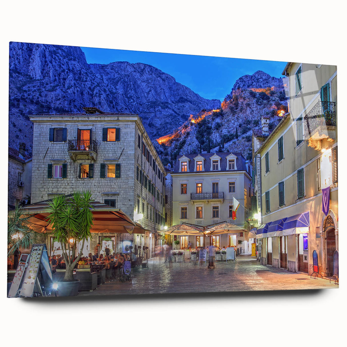 Large abstract wall art of a Montenegro scenery in muted blue and green tones on acrylic glass.