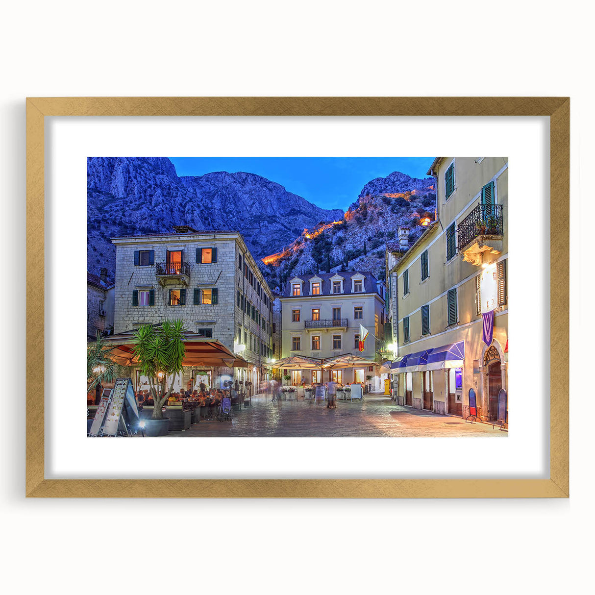 Abstract art print of Montenegro scenery in muted earth tones, framed in gold, suitable for dining room decor.
