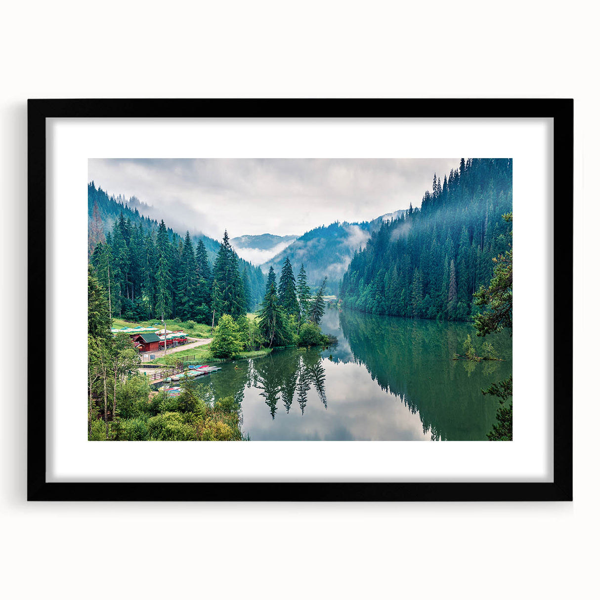 Abstract art print depicting textured, colorful scenery of Romania, set in a black frame with mat.