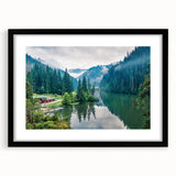 Abstract art print depicting textured, colorful scenery of Romania, set in a black frame with mat.