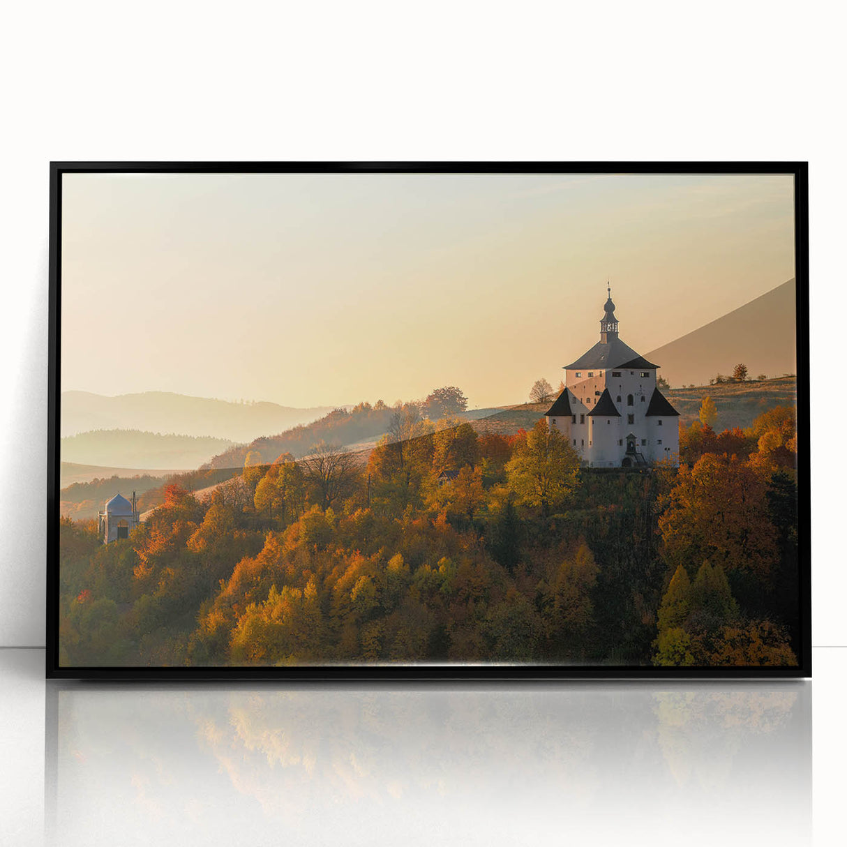 Large abstract wall art featuring a European Slovakian scenery in muted earth tones, framed in black acrylic.