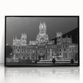 Large abstract wall art depicting a colorful Madrid cityscape on a black framed acrylic, ideal for modern living room decor.