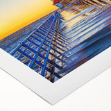 Art deco poster of Stockholm skyline in muted blue and gold tones on rolled canvas, suitable for dining room decor.