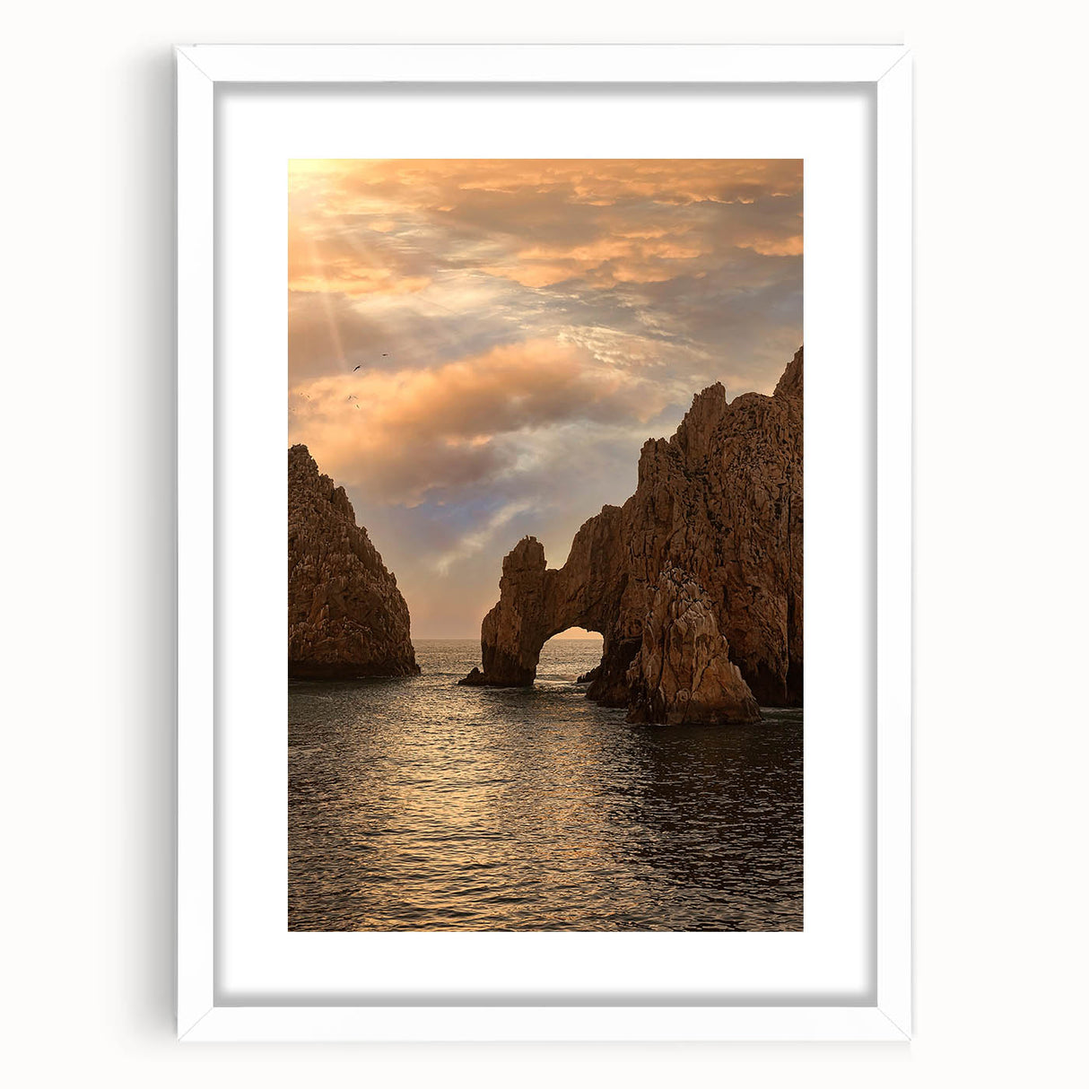 Abstract art print of Cabo San Lucas scenery in muted blues and greens on a framed white mat, ideal for dining room decor.