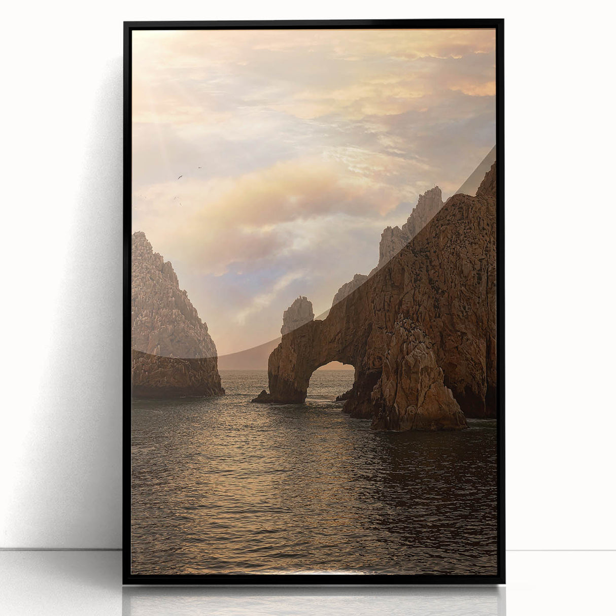 Framed acrylic print of a large abstract depiction of Cabo San Lucas with vibrant blue and orange tones.