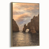Framed canvas wall art depicting a vintage-style landscape of Cabo San Lucas in muted gold and black tones.