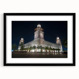 Extra large abstract art print of Middle Eastern scenery in vibrant colors on a textured canvas, framed in black.