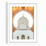 Abstract art print of Abu Dhabi skyline in muted gray and blue tones on a framed white mat.
