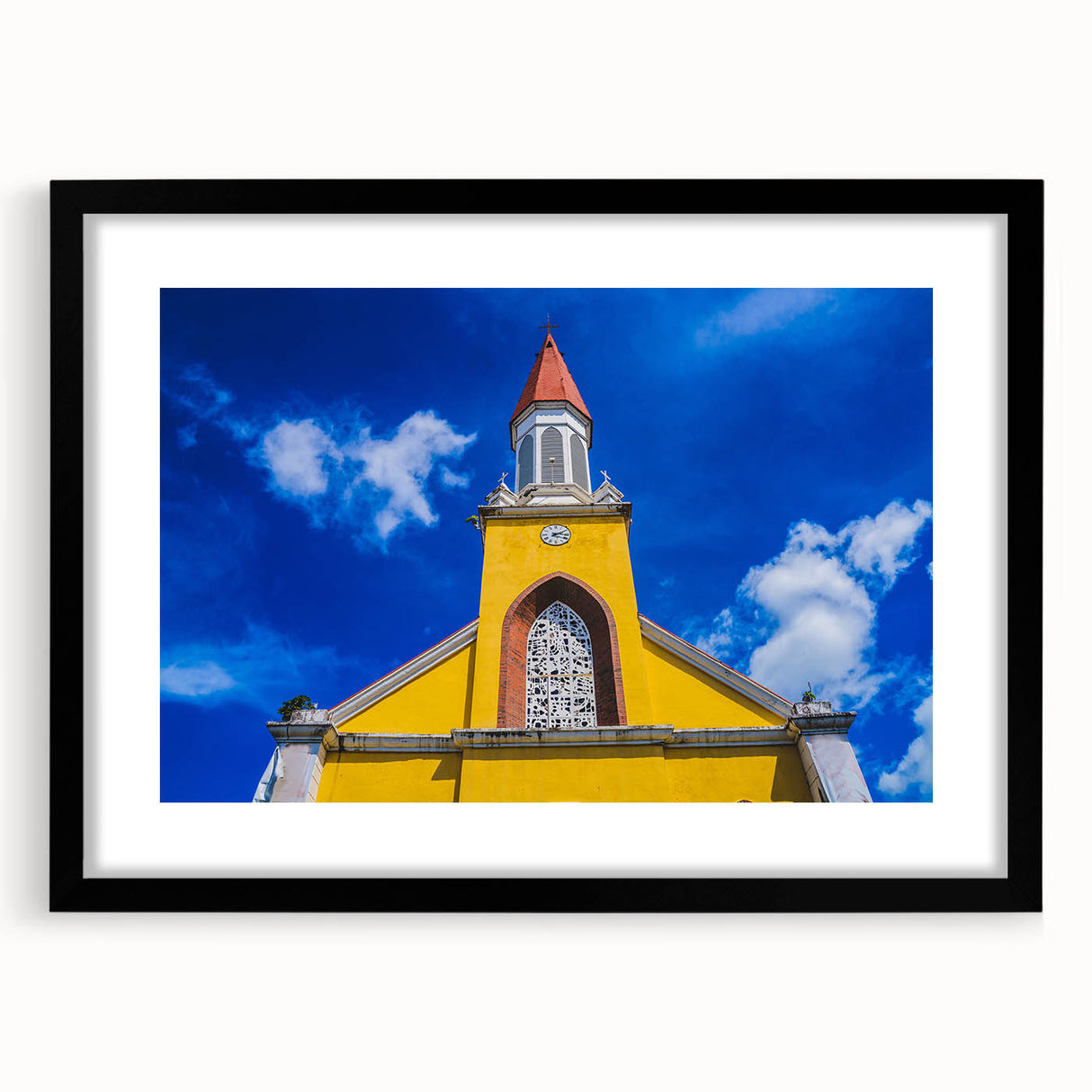 Extra large abstract art print of a colorful Tahitian landscape on textured canvas, framed in black.