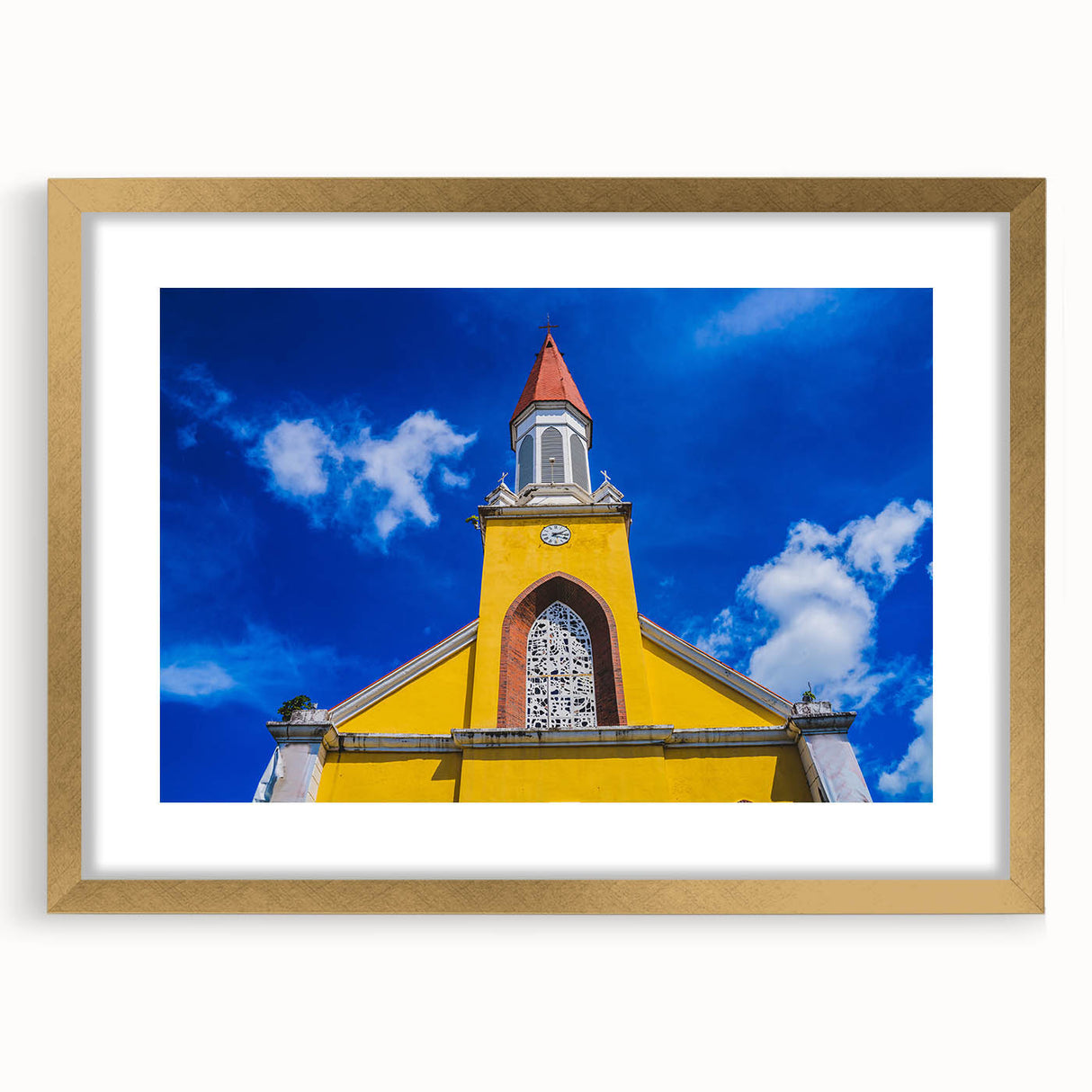 Extra large abstract art print of a Tahitian landscape in textured shades of blue and green, framed in gold.