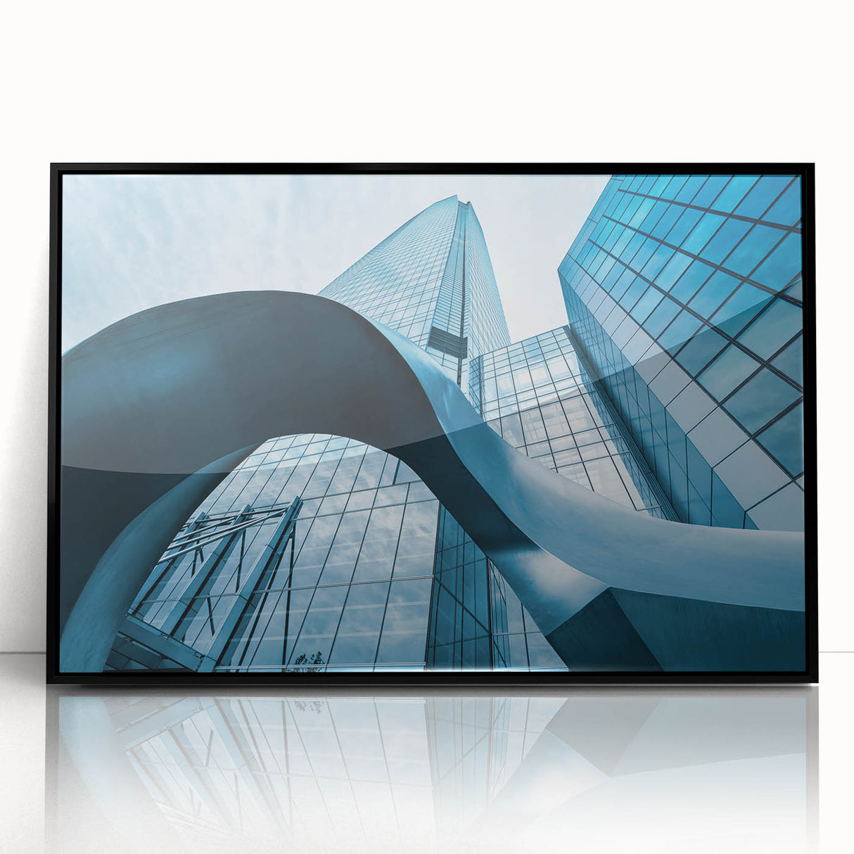 Large abstract wall art featuring a stylized Santiago cityscape in muted earth tones on a black framed acrylic.