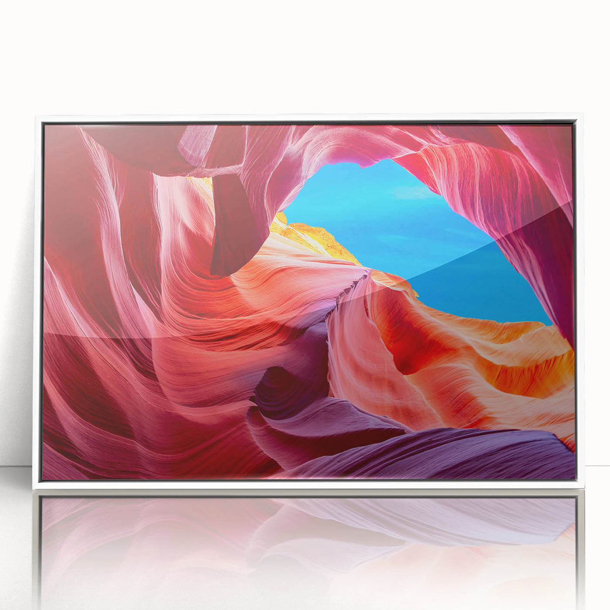 Art deco poster of Antelope Canyon in Arizona, featuring earthy red and orange tones on a white framed acrylic print.