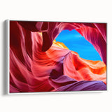 Vintage poster art of Antelope Canyon in vibrant orange and red tones on a framed canvas, ideal for living room decor.