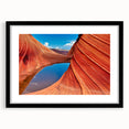 Colorful abstract art print of Arizona's Coyote Buttes on a textured, extra large canvas, framed in black.