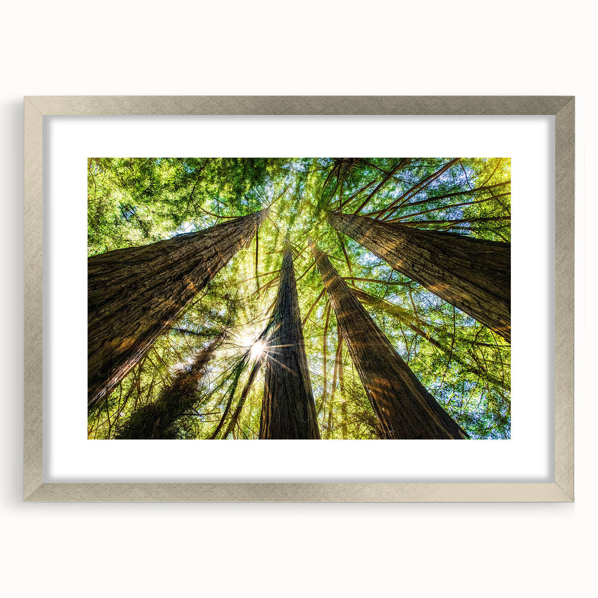 Textured art of abstract Big Sur scenery in muted earth tones on a framed silver mat, suitable for bedroom decor.