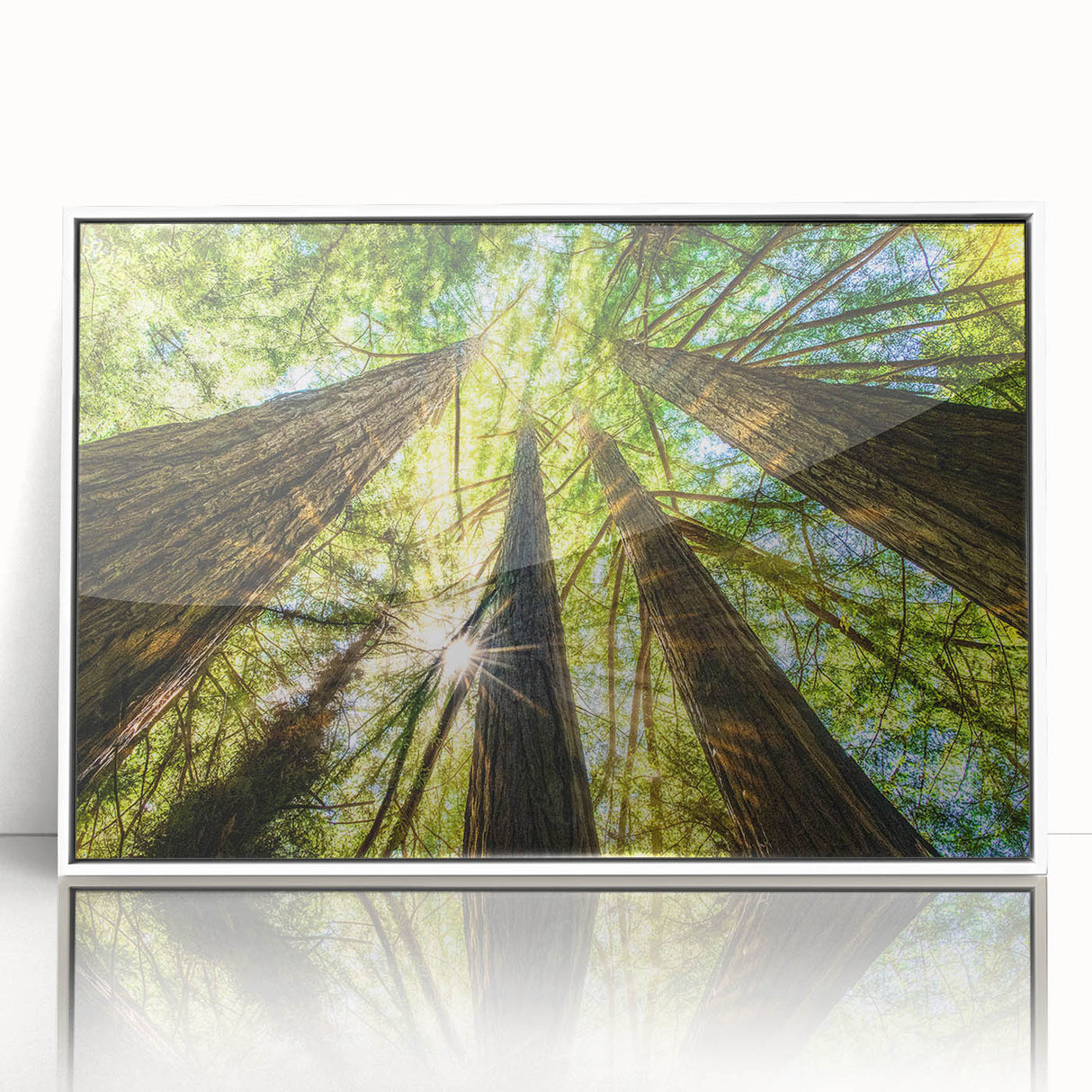 Acrylic print of Big Sur coastline in muted blues and greens, framed in white, suitable for modern art wall decor.