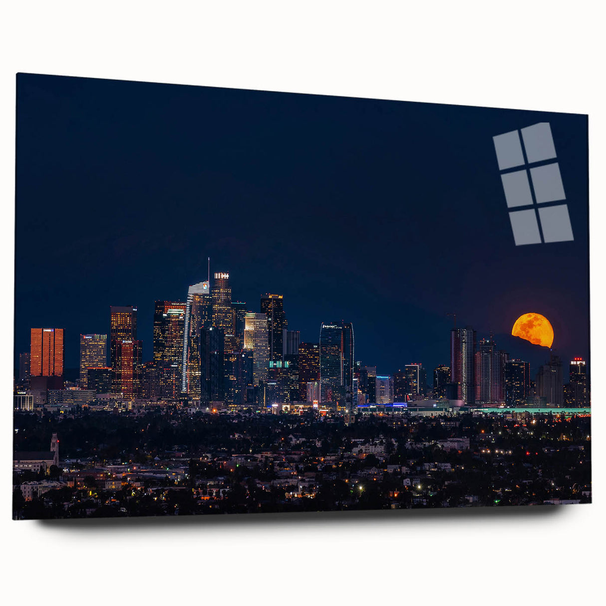 Large abstract wall art of Los Angeles skyline in muted blue and gray tones on acrylic glass.