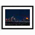 Extra large abstract art print of Los Angeles skyline in vibrant colors on a textured canvas, framed in black.
