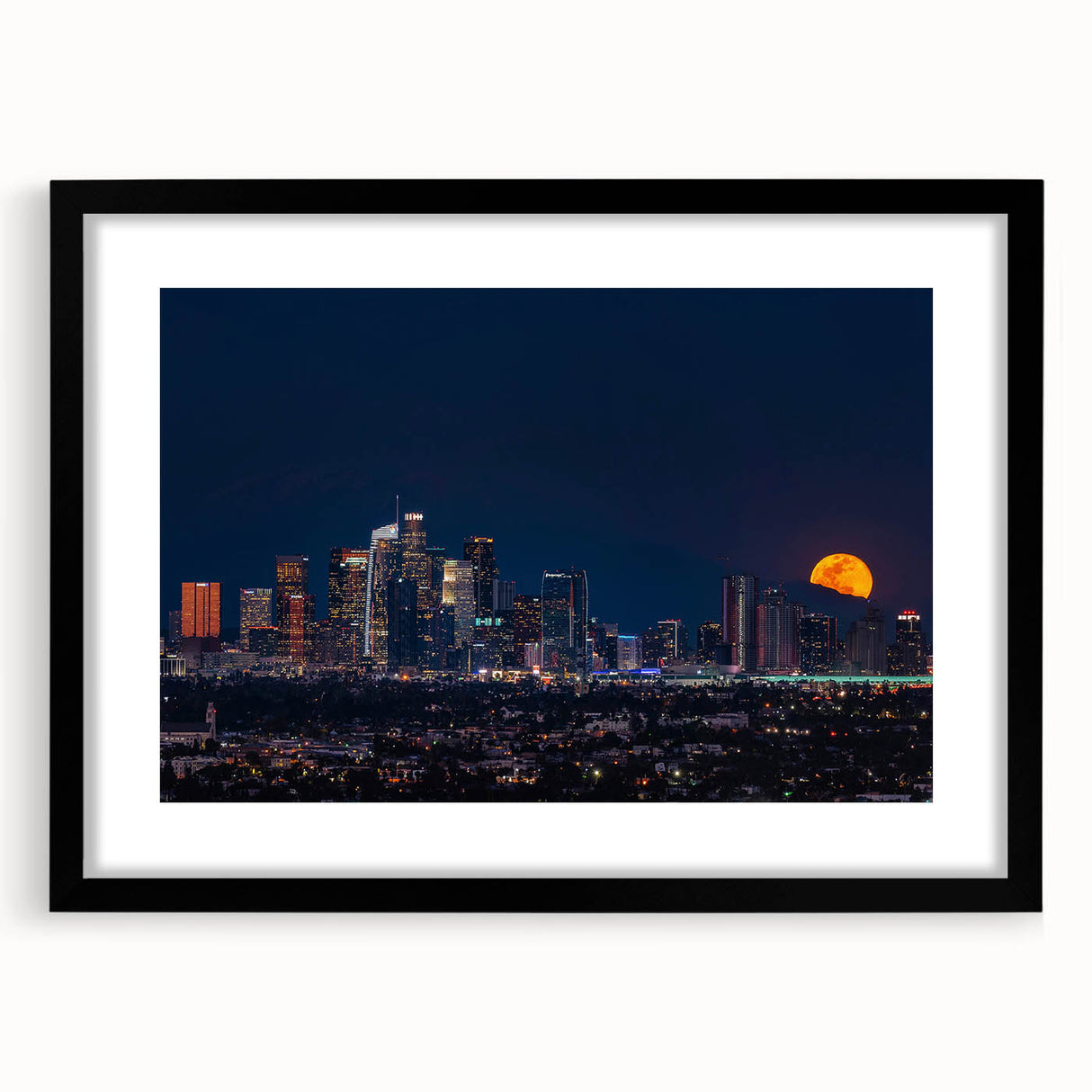 Extra large abstract art print of Los Angeles skyline in vibrant colors on a textured canvas, framed in black.