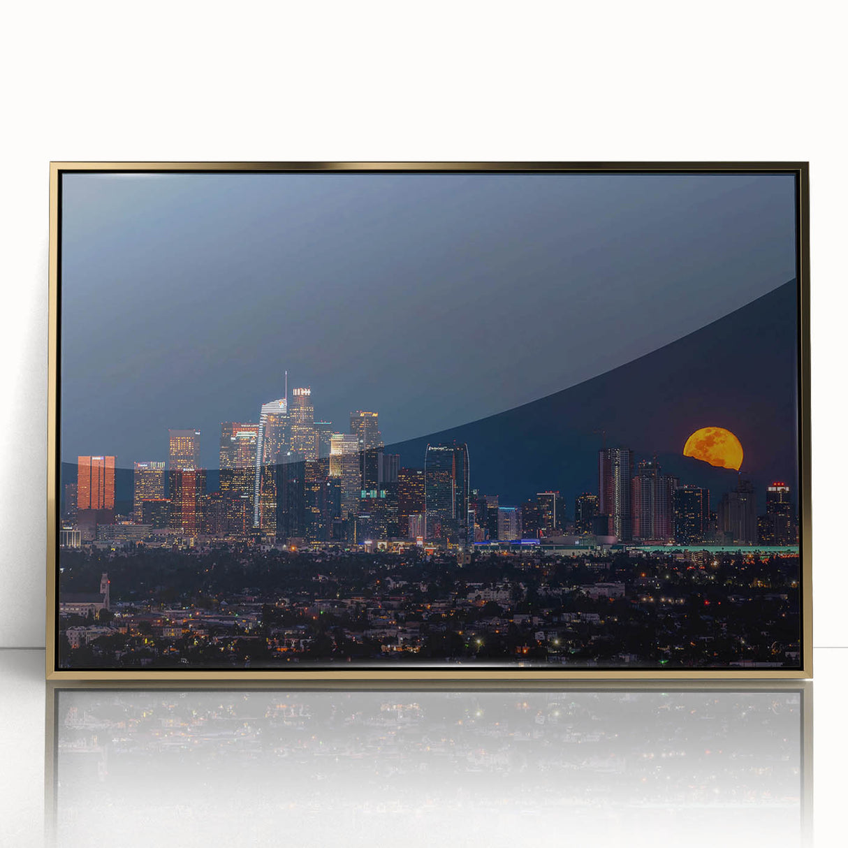 Large art print of Los Angeles skyline in gold tones on acrylic, framed, in mid-century modernist style.
